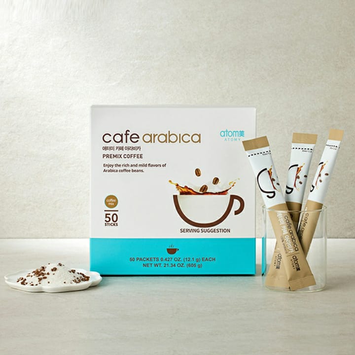 Atomy Cafe Arabica premix coffee 50-stick box with coffee sticks in a glass