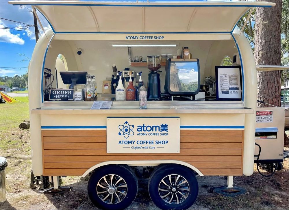 Atomy Coffee Shop trailer with an open serving counter